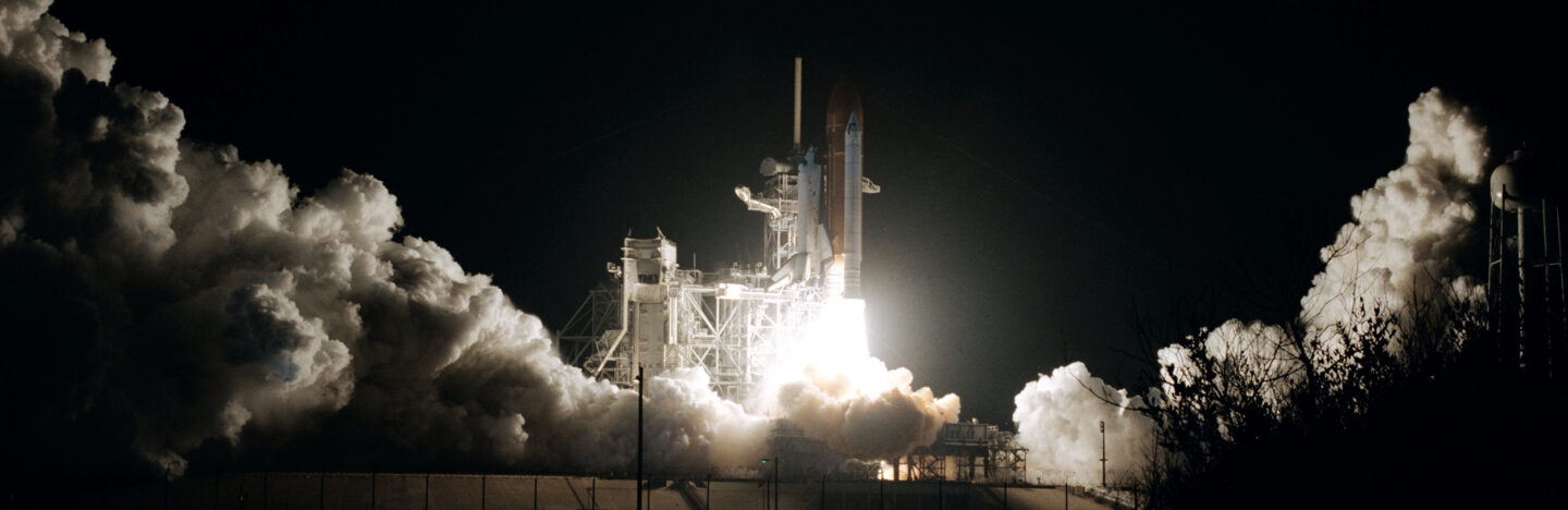 space shuttle Columbia launching at night